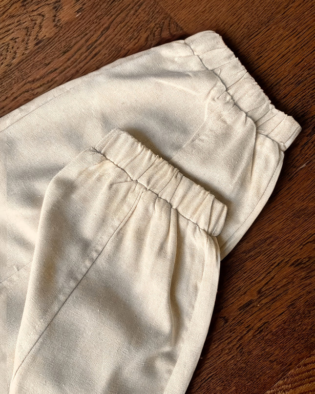 Elegant Beige Sleeveless Top & Button- Pants Set - Chic V-Neck, Long Sleeveless Shirt with Ruffled Detail, High-Waisted Wide-Leg Pants, Perfect for Casual or Office Wear, Casual Attire|Ruffled Detail Top|Button Detail Pants